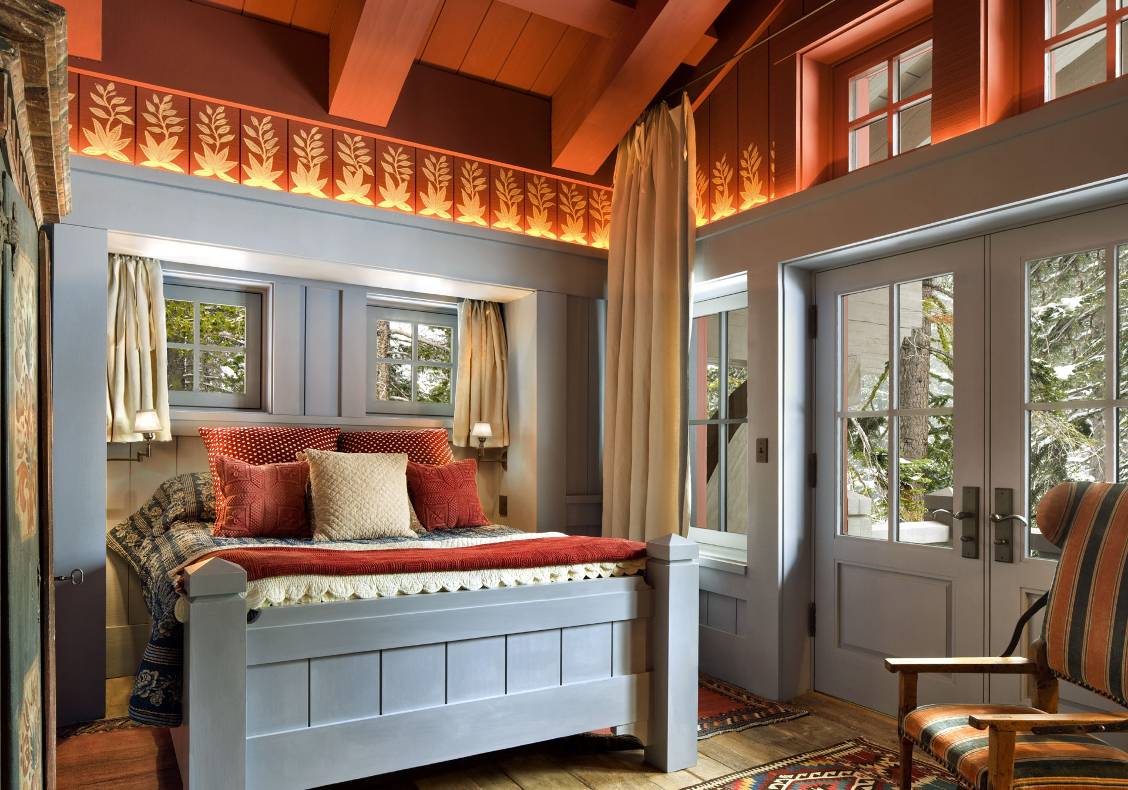 Guest bedroom with custom made bed, heavy timber ceiling, balcony to front porch.