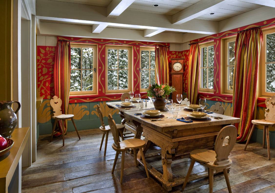 Dining room with antique alpine table and chairs, reclaimed oak flooring.