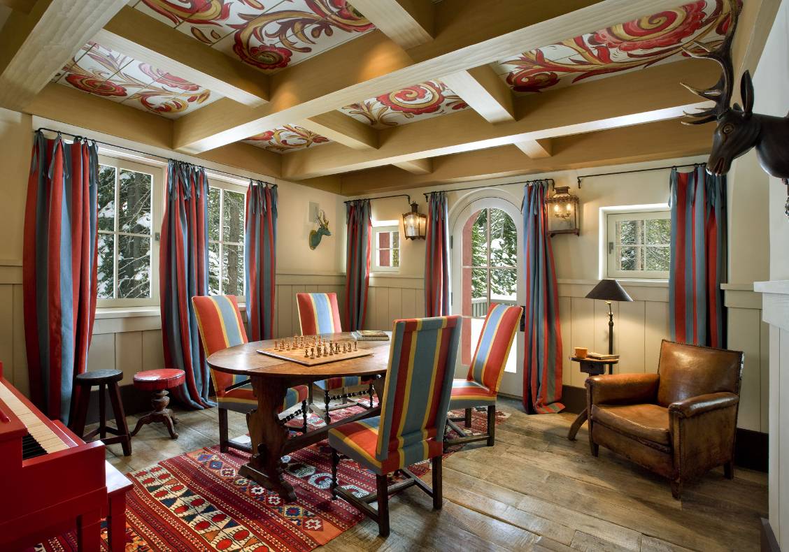 Game room with painted ceiling.