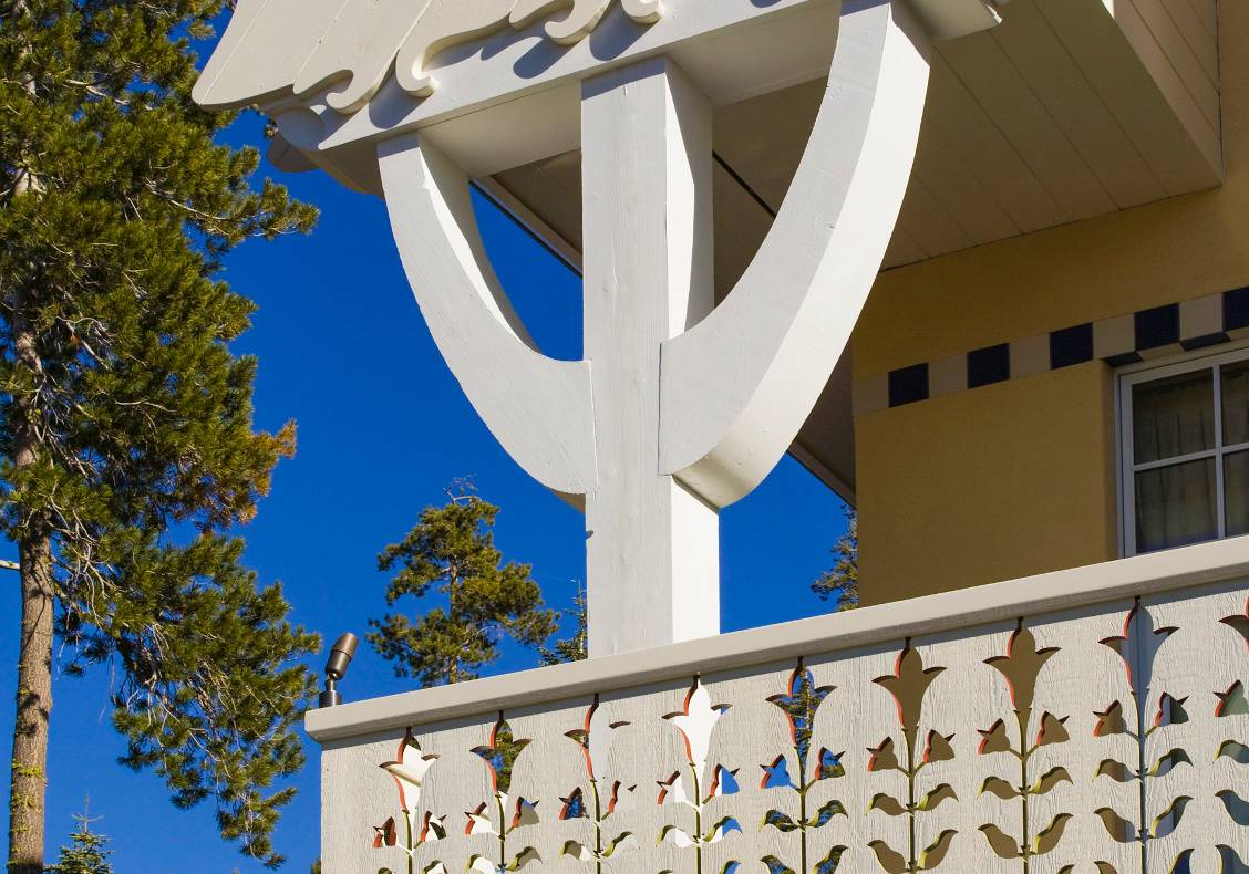 A frieze of flowers is a playful railing motif.
