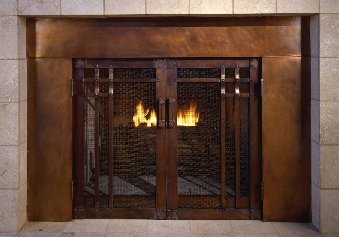 The hand forged fire guard was designed to complement the interior balcony woodwork.