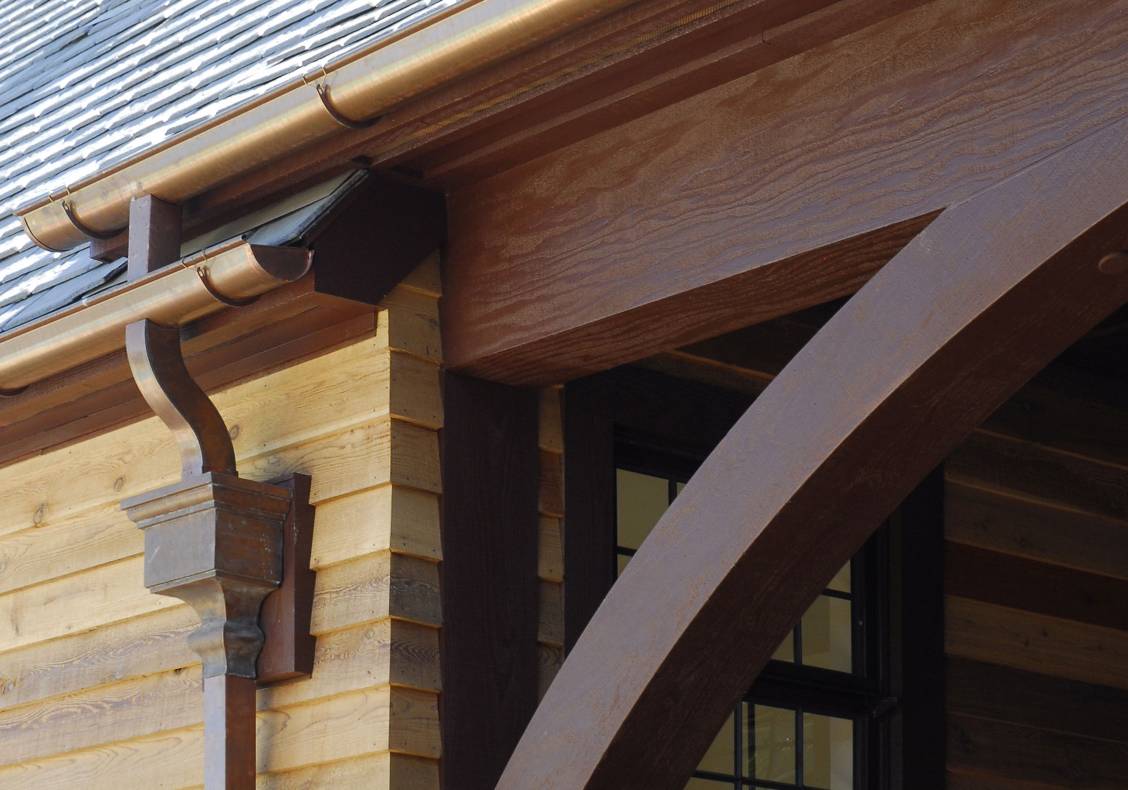 These hefty timber details give great solidity to the design of the new Aquatic Center building, and are firm in recalling an equestrian, wooden barn-like tradition.