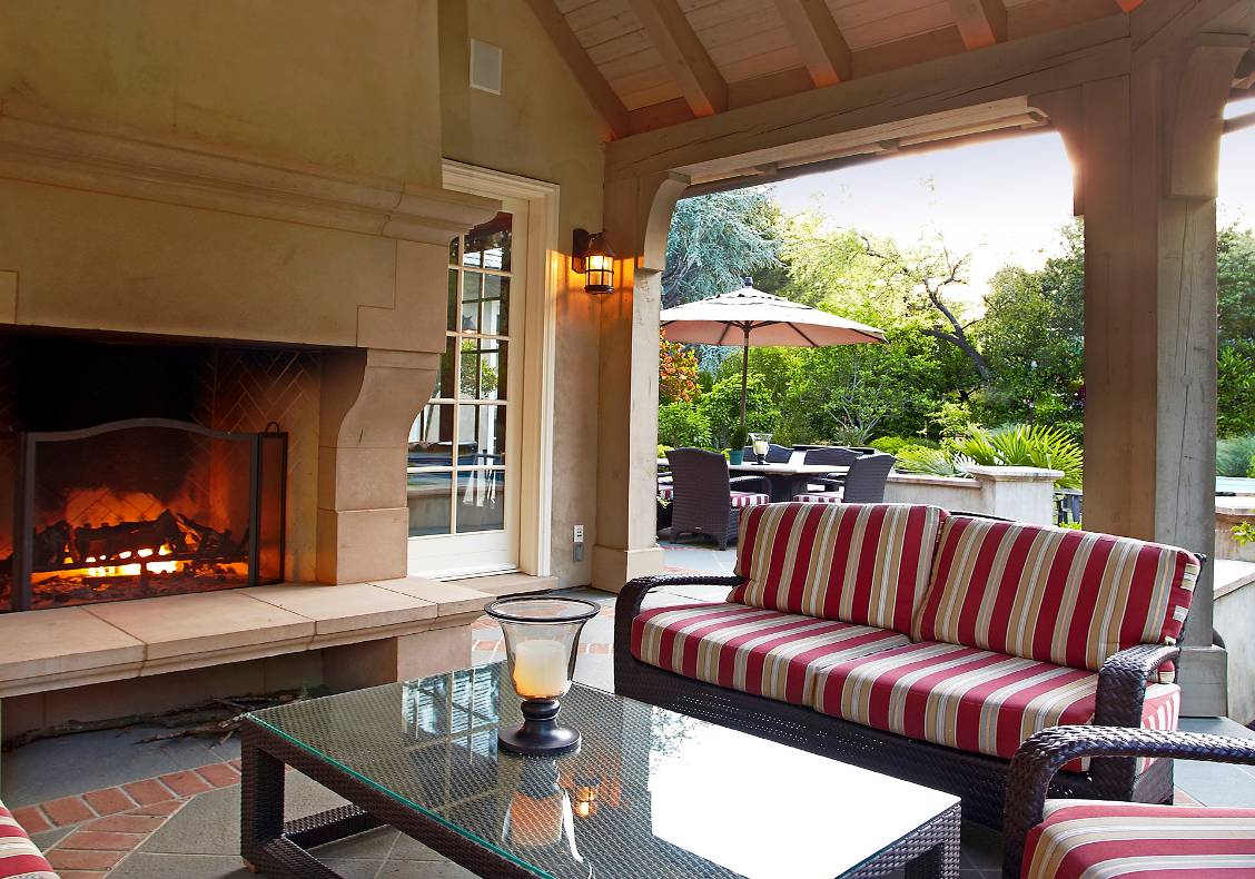 Covered porch with fireplace