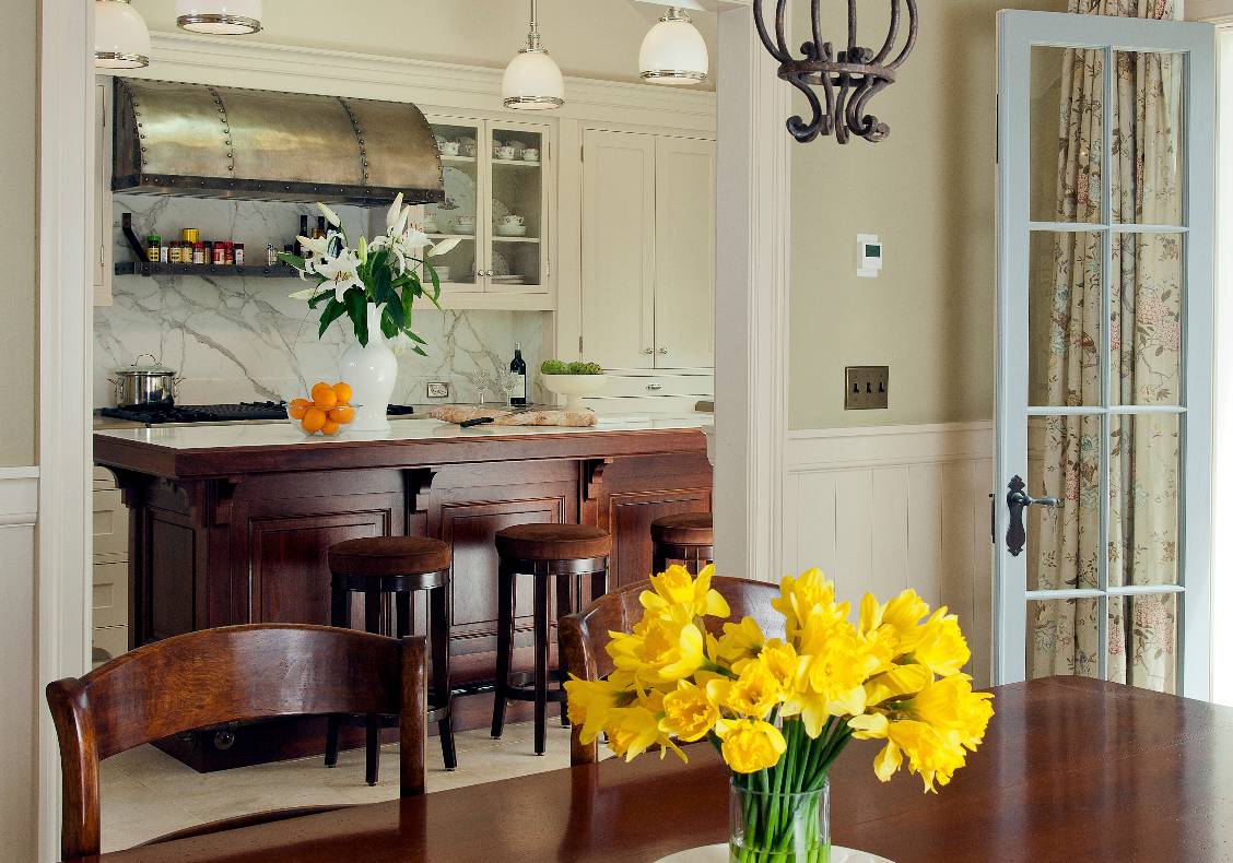 The informal dining room opens to both the kitchen and terrace.