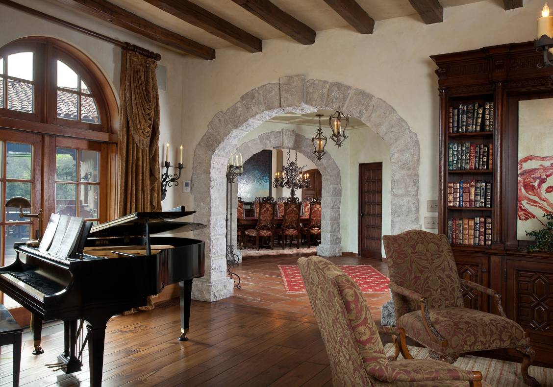 Niches, stone arches, and deep embrasures accentuate the thick walls typical of Spanish colonial construction.