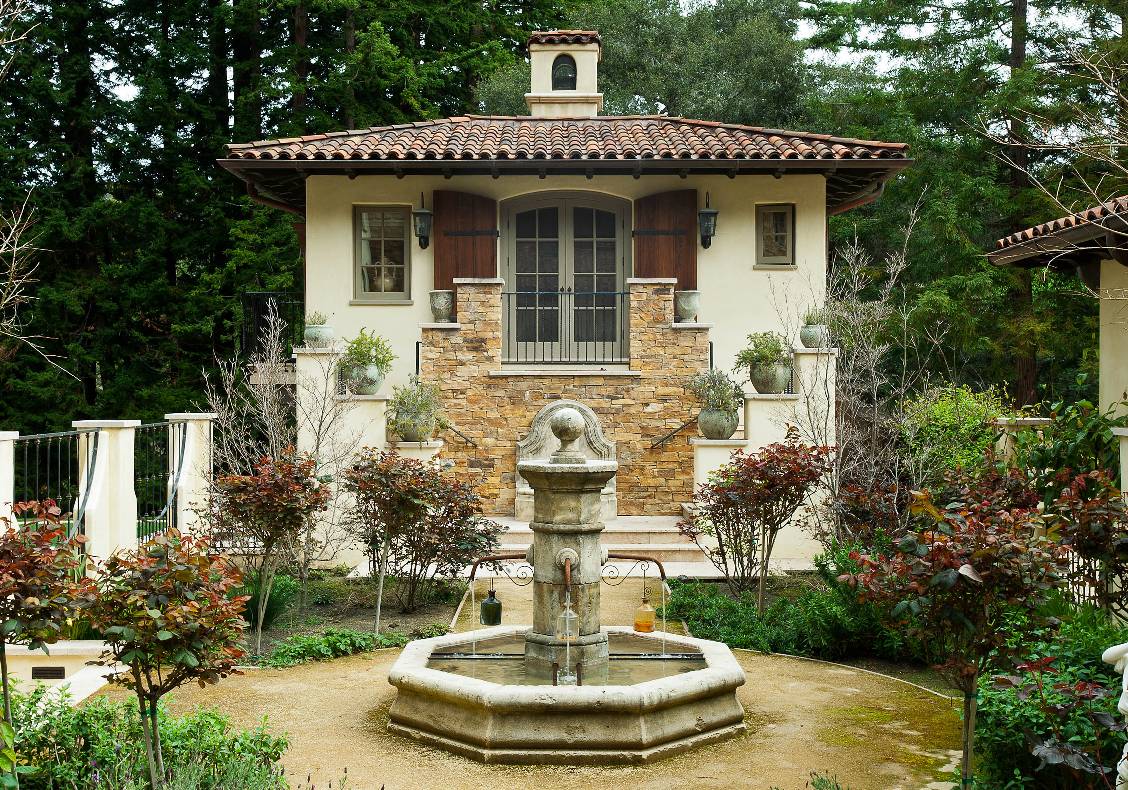 The home wraps around the wonderful, enclosed fountain courtyard.