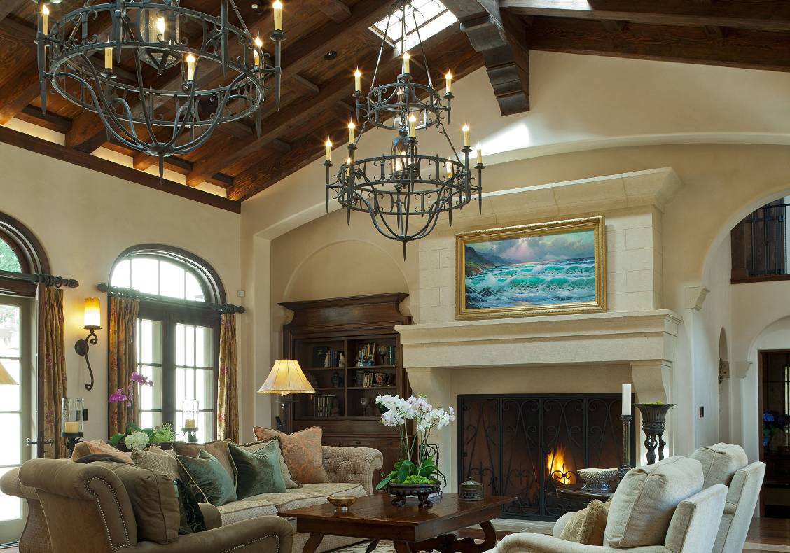The great living room is dominated by an Italian-cut limestone mantel with a 6 foot Rumford firebox.