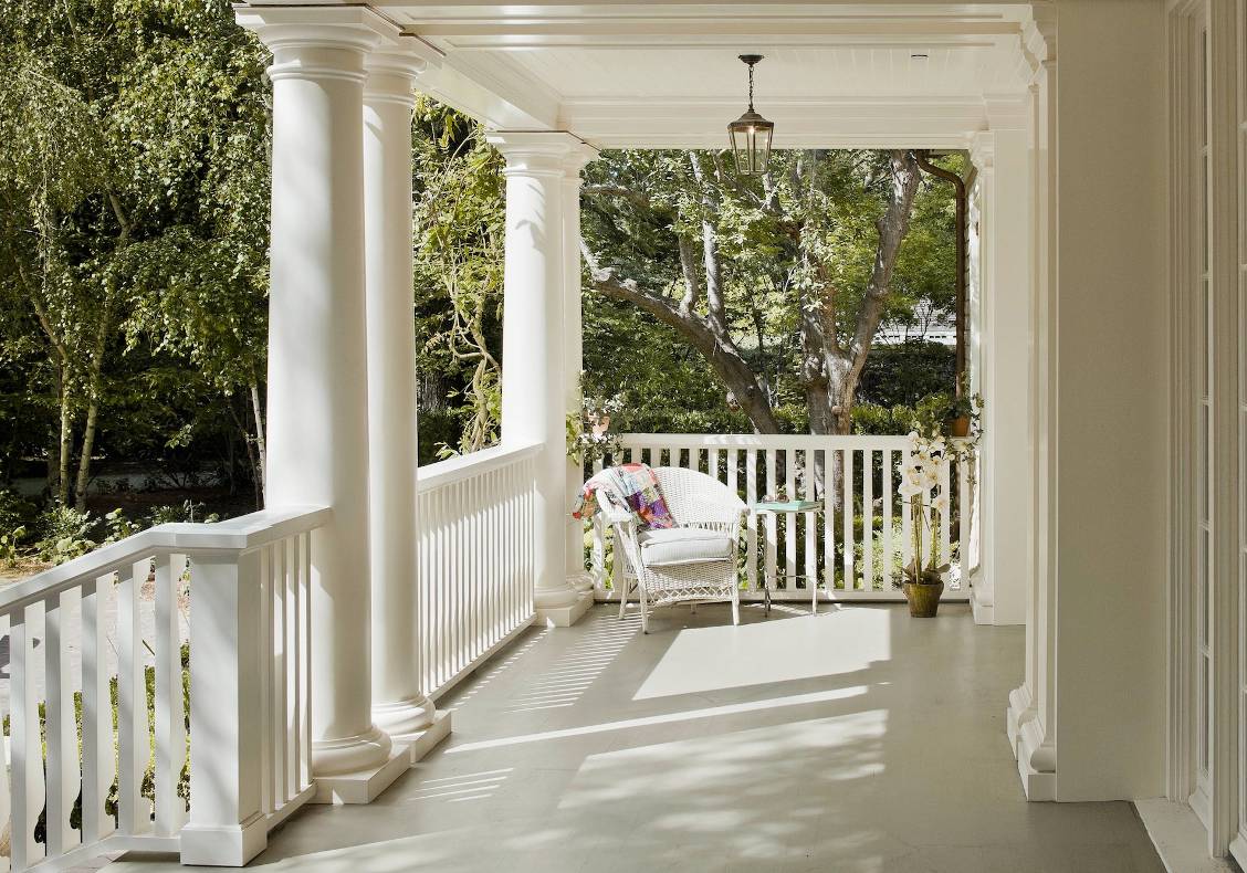 The deep Entry porch on the South East facade provides shading for the Living Room & the perfect space to enjoy the California climate.