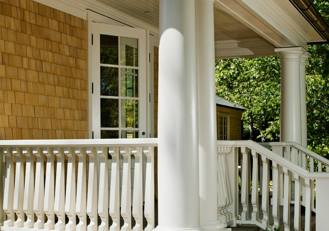The existing pilasters were retained while new columns & railings were added.