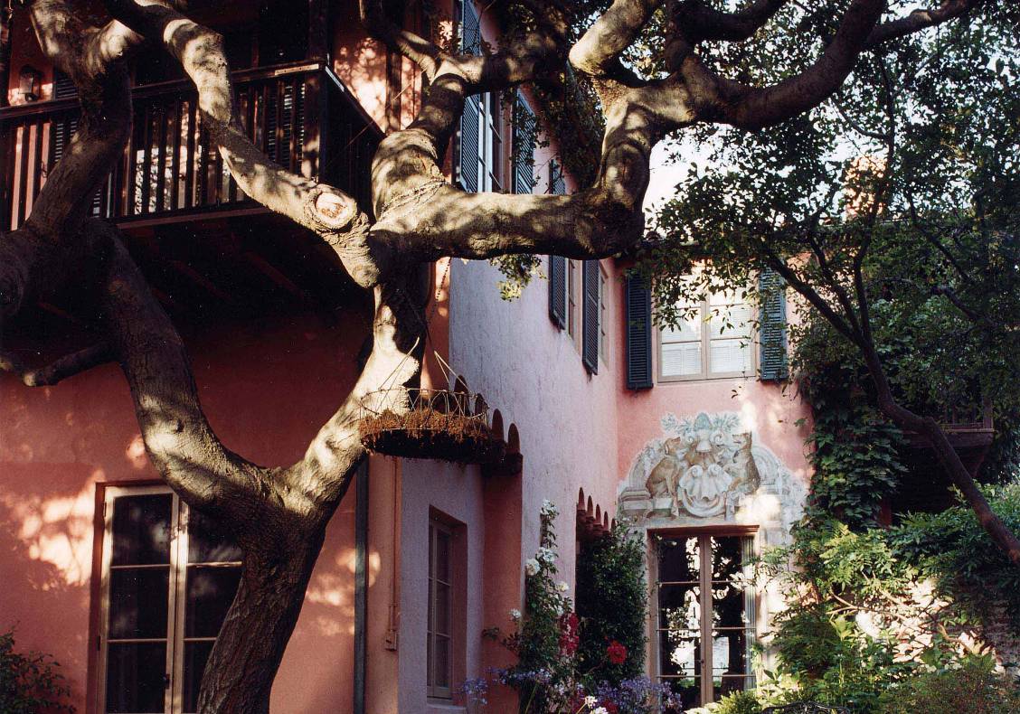 Steps connect outdoor spaces around the building's perimeter.