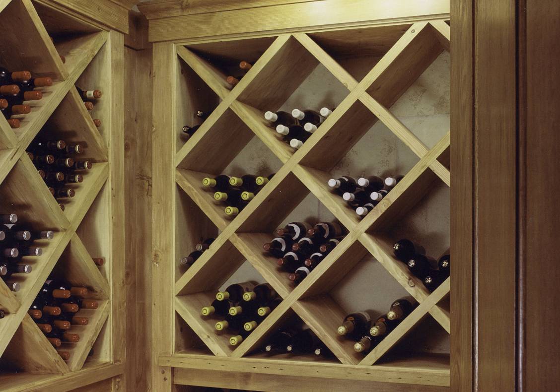 Wine is stored in a barrel-vaulted cellar.