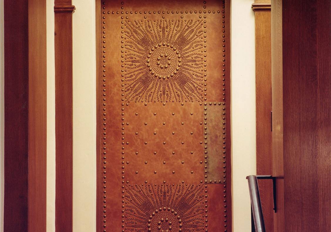 Studded door to the new media room.