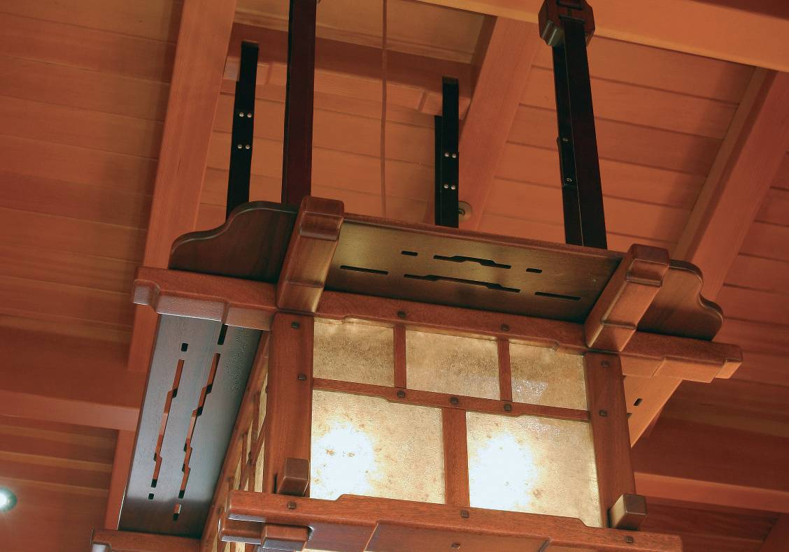 Custom designed by the architect, this mahogany, black walnut, leather and mica lantern was crafted with lap joints, mortise and tenon joints.  Two such lanterns hang in the great room of the house.