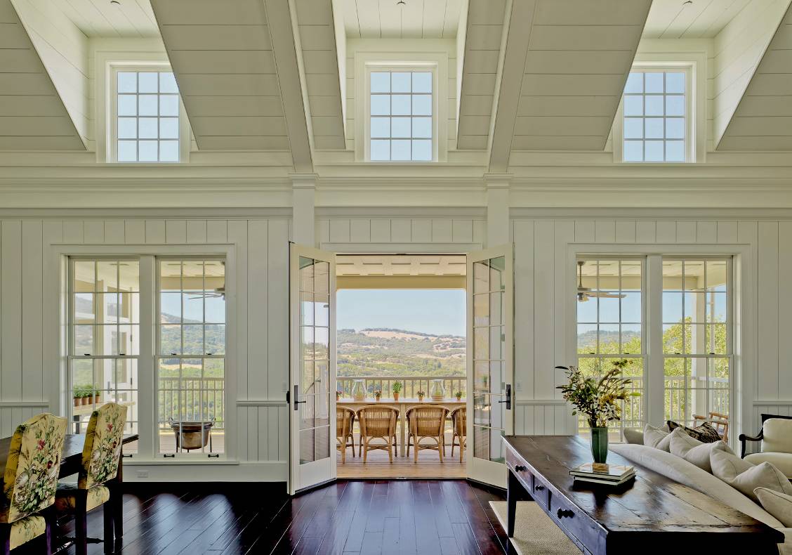 Looking out on axis through the living room and covered porch is a spectacular view of Bennett Valley.