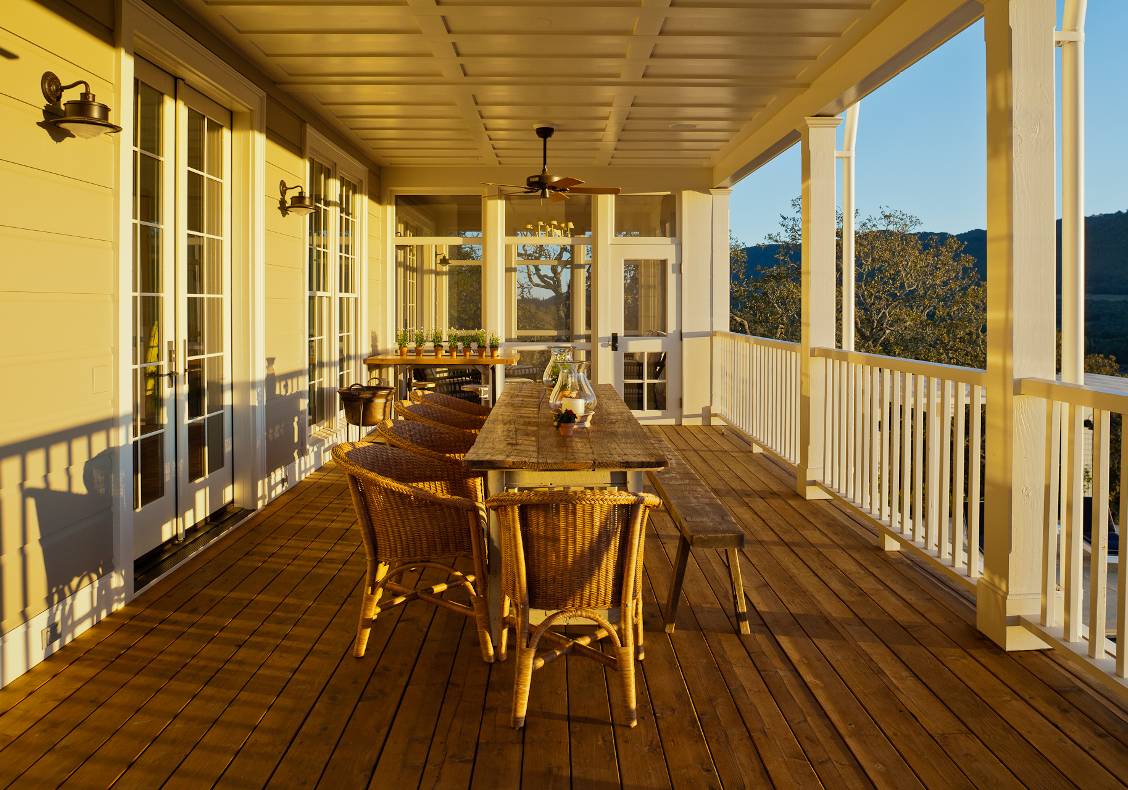 A screened dining porch opens out to the western view from the kitchen.